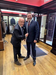 Master Tailor Louis Copeland measuring Karl Fitzpatrick up for success in the EY Entrepreneur of the Year Final.